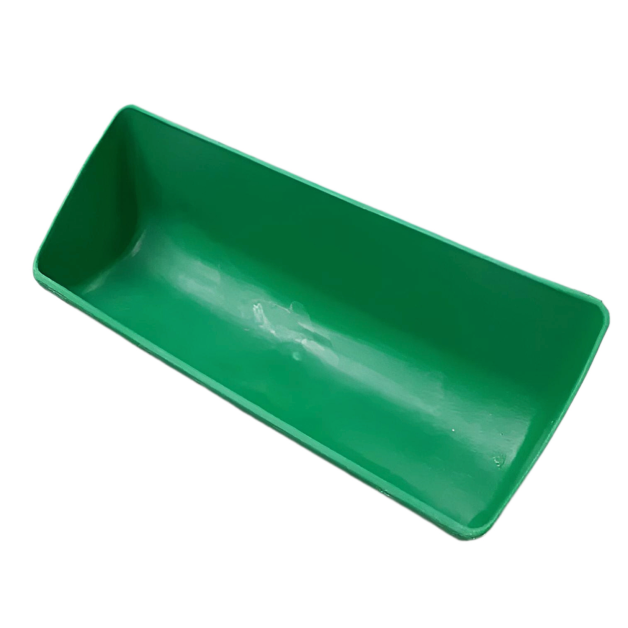Wall-mounted livestock feeders. Wall-mounted livestock feeders.