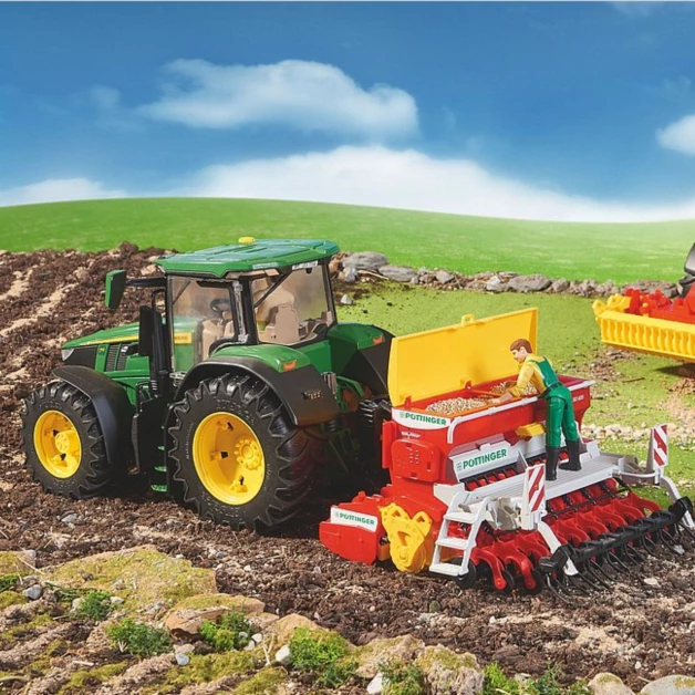 Semoir avec herse rotative Pöttinger jouet Bruder 023478