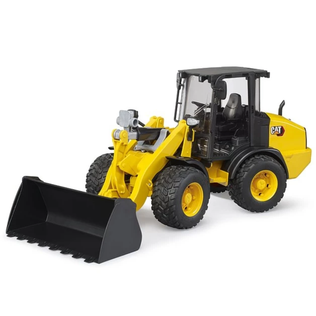 CAT Compacte kniklader op wielen