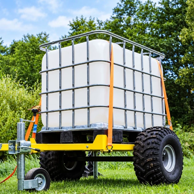 Quad trailer with 600 L IBC tank.