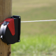 Electrifiable retractable barrier